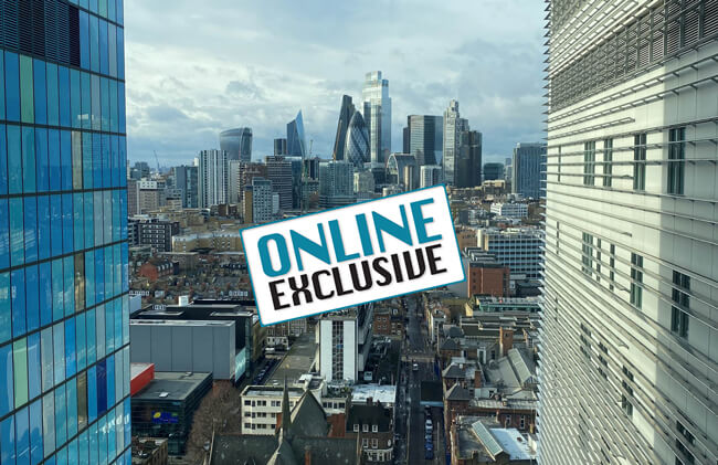 Critical care article stock image of city landscape with Online Exclusive stamp.