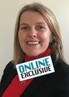 Photo of Jo Cresswell with Online Exclusive stamp.